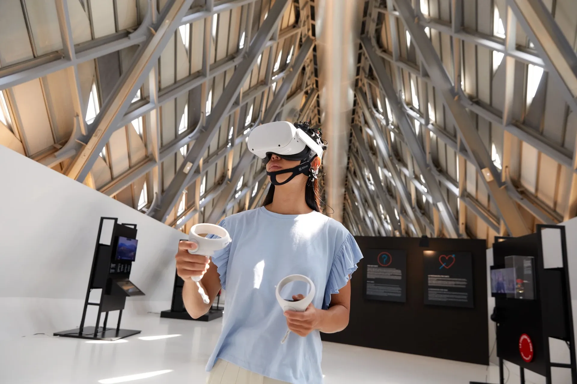 Participant wearing Bitbrain Versatile EEG with VR headset for brain monitoring